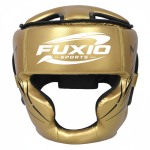Protetor de cabeça de boxe Fuxio Sports dourado com acolchoamento preto e logotipo branco.